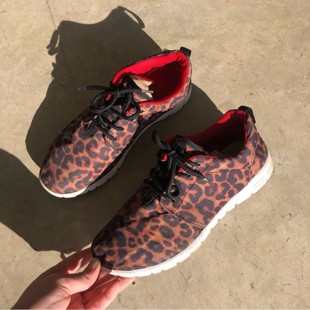 cheetah and red sneakers